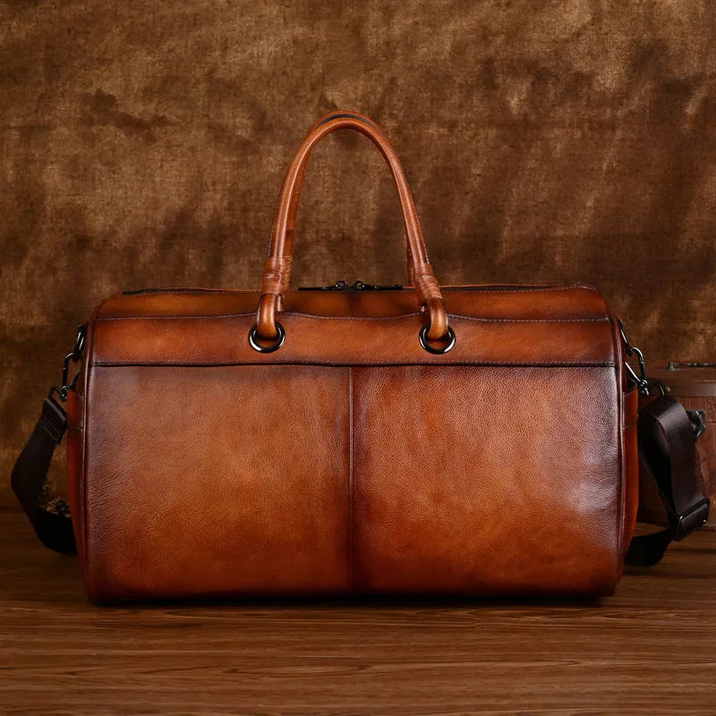 Handmade brown retro leather tote bag with top layer cowhide and large capacity.