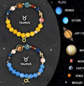 Twelve Zodiac Sign natural stone bead bracelets laid out, showing two bracelets with adjustable closures.