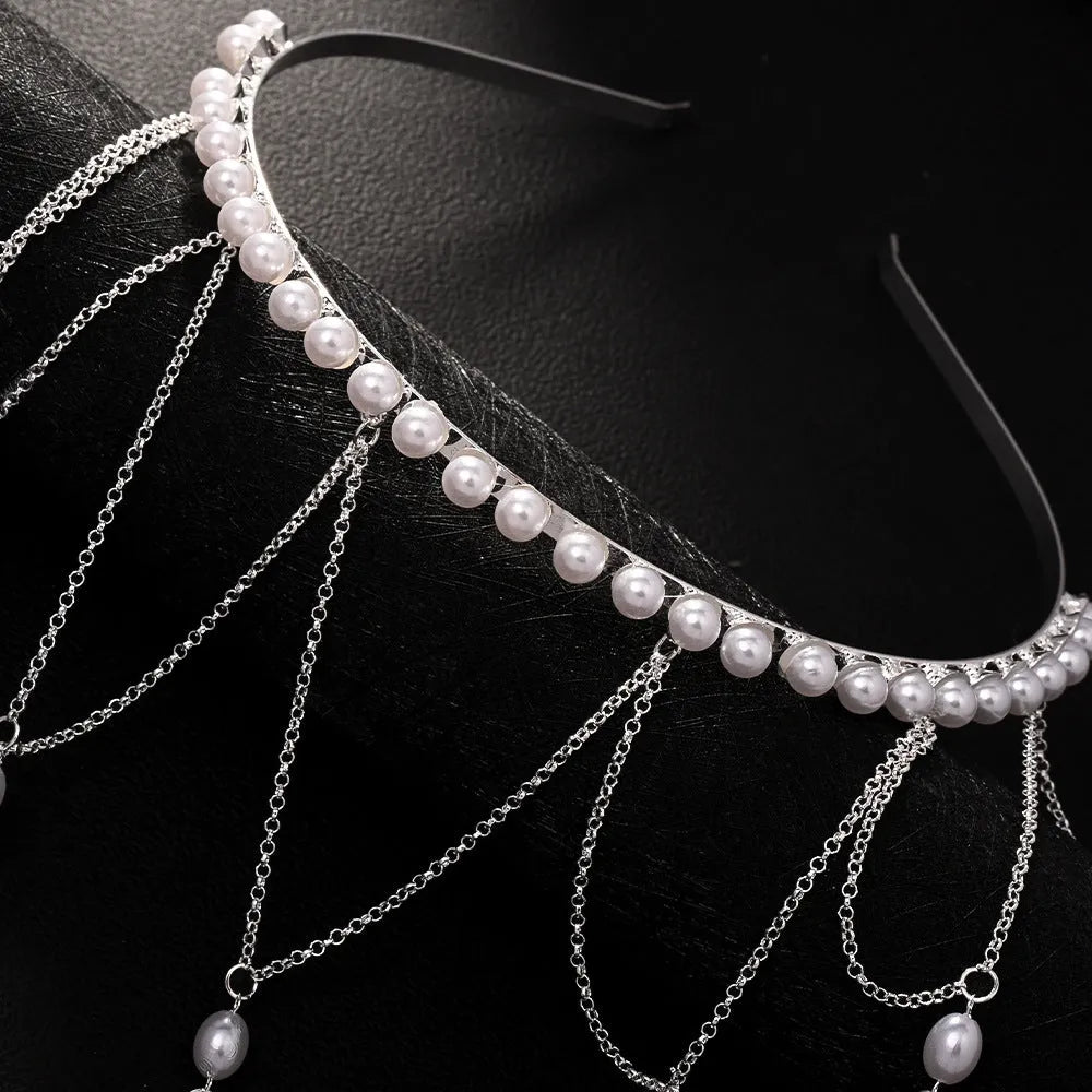 Gold mesh hair chain with pearl embellishments and dangling tassel detail for women