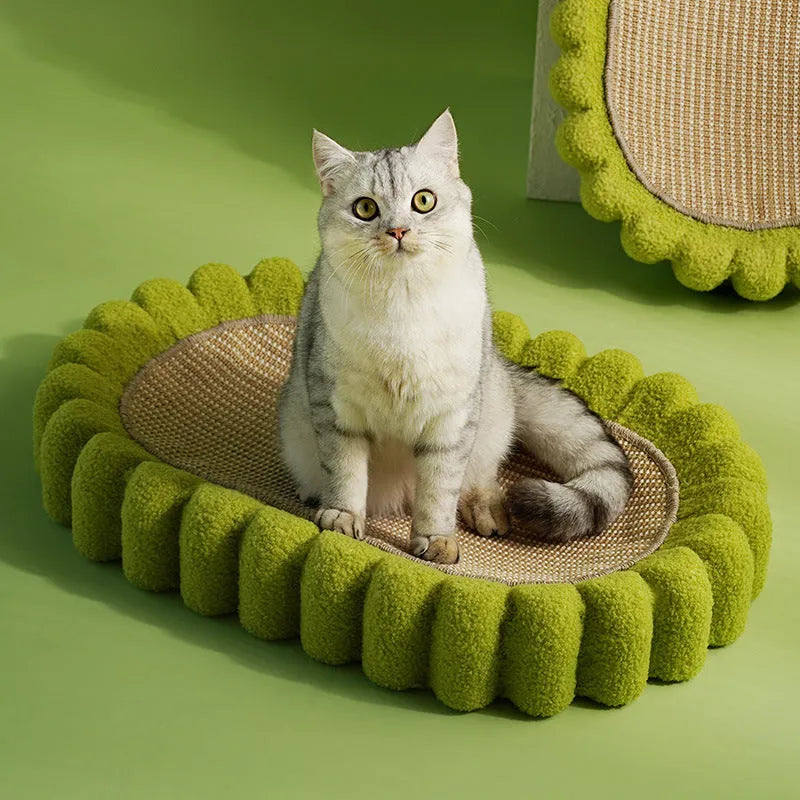 Green oval cat scratch pad bowl with sisal scratching surface measuring 650mm