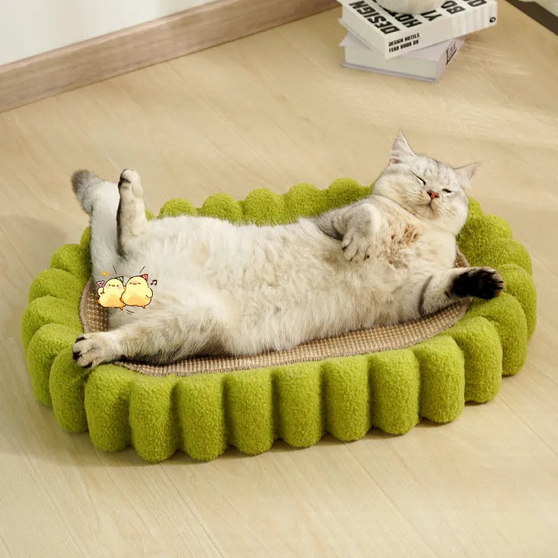 Green oval cat scratch pad bowl with sisal scratching surface measuring 650mm
