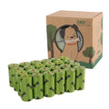 Roll of degradable military green dog poop bags with black bone print, showing bag size and dispenser option.