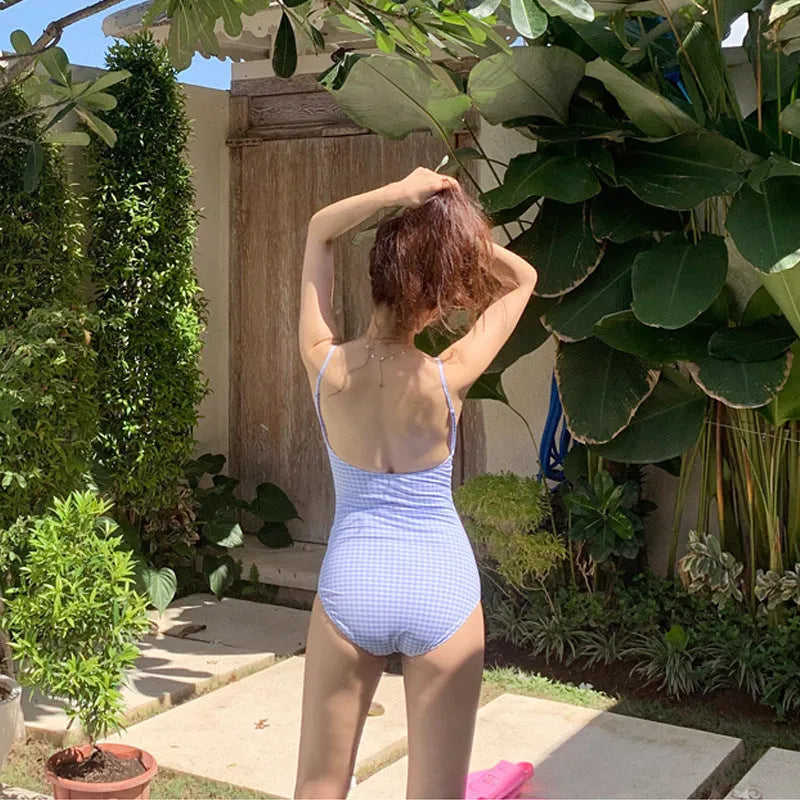 Blue and white plaid pattern on a women's one-piece nylon swimsuit