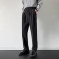 Men's straight loose fit suit trousers in apricot and black colours, made from polyester fabric.