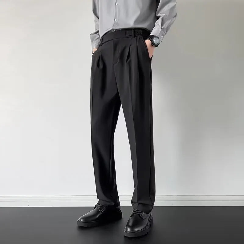 Men's straight loose fit suit trousers in apricot and black colours, made from polyester fabric.