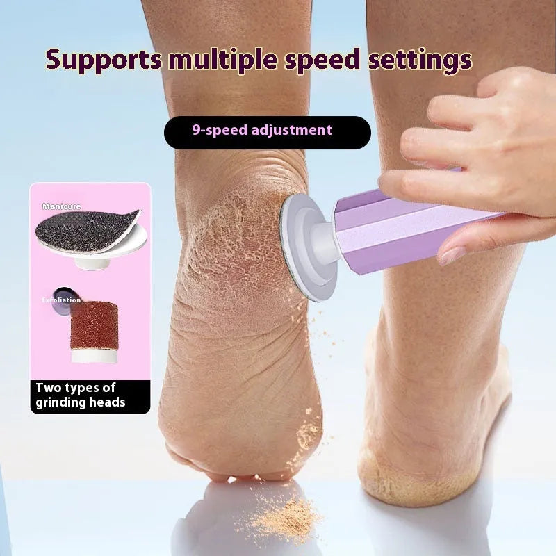 Pink electric callus remover tool with USB cable and pack of sandpaper grinding wheel attachments on a table.