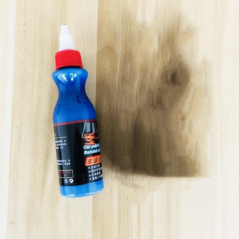 Blue car scratch repair kit with applicator tool for automotive paint touch-ups