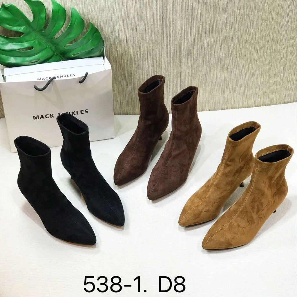 Women's black ankle boots with pointed toe and stiletto heel, mid-calf length