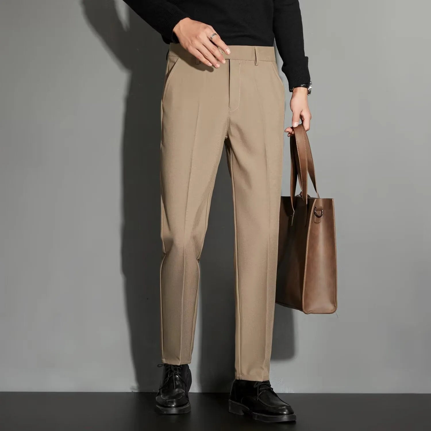 Men's straight cut suit trousers with ankle-length finishing in polyester blend fabric