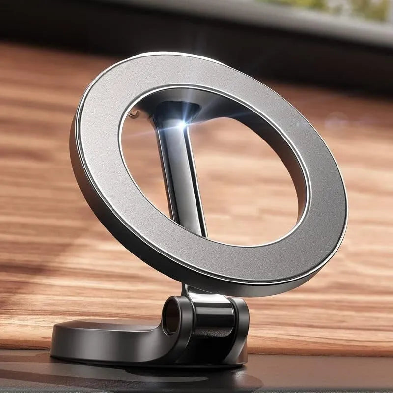 All-metal foldable magnetic car phone holder in Qian colour mounted on vehicle dashboard
