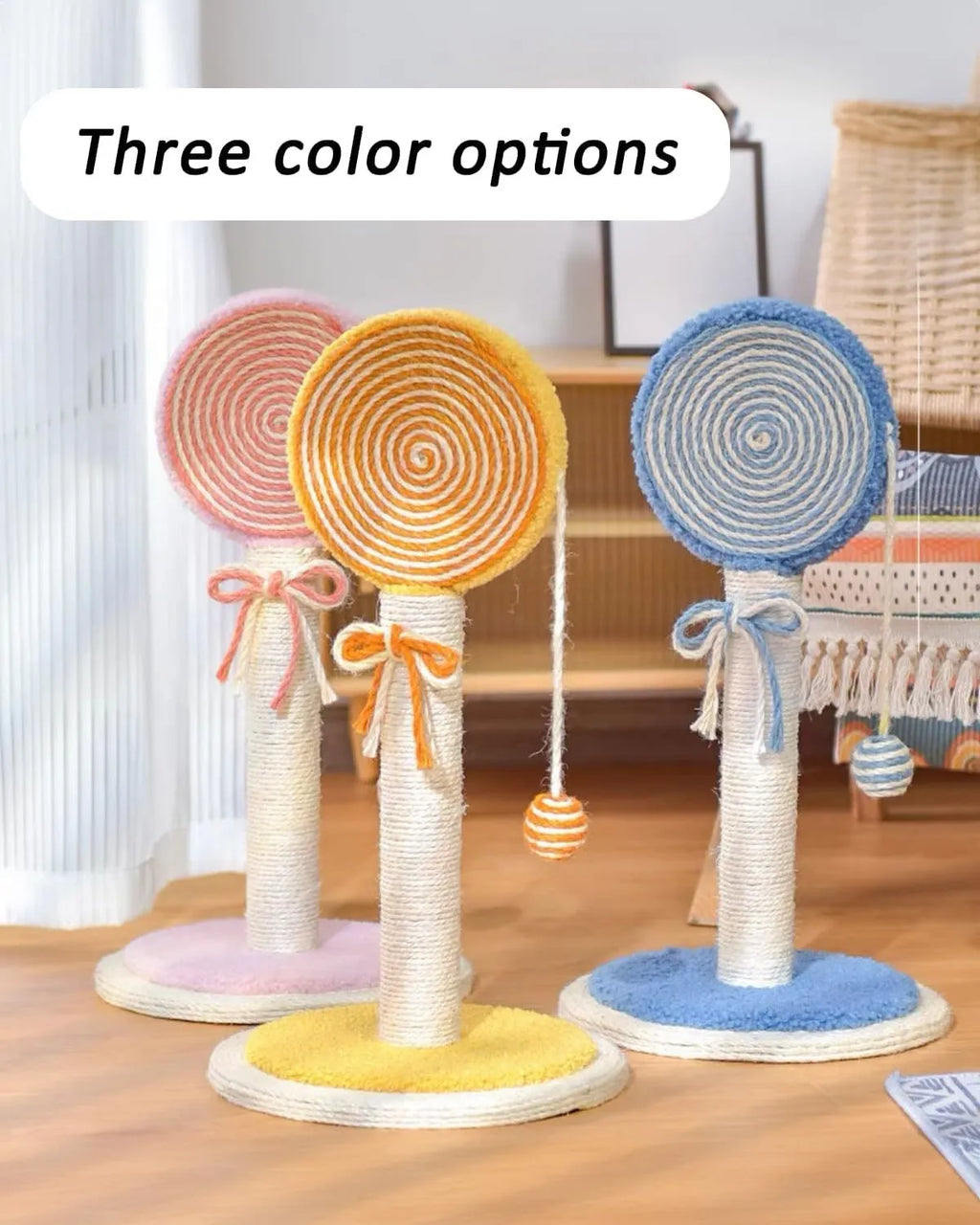 Blue cat scratching post with natural sisal rope and a hanging ball on a sturdy wooden base.