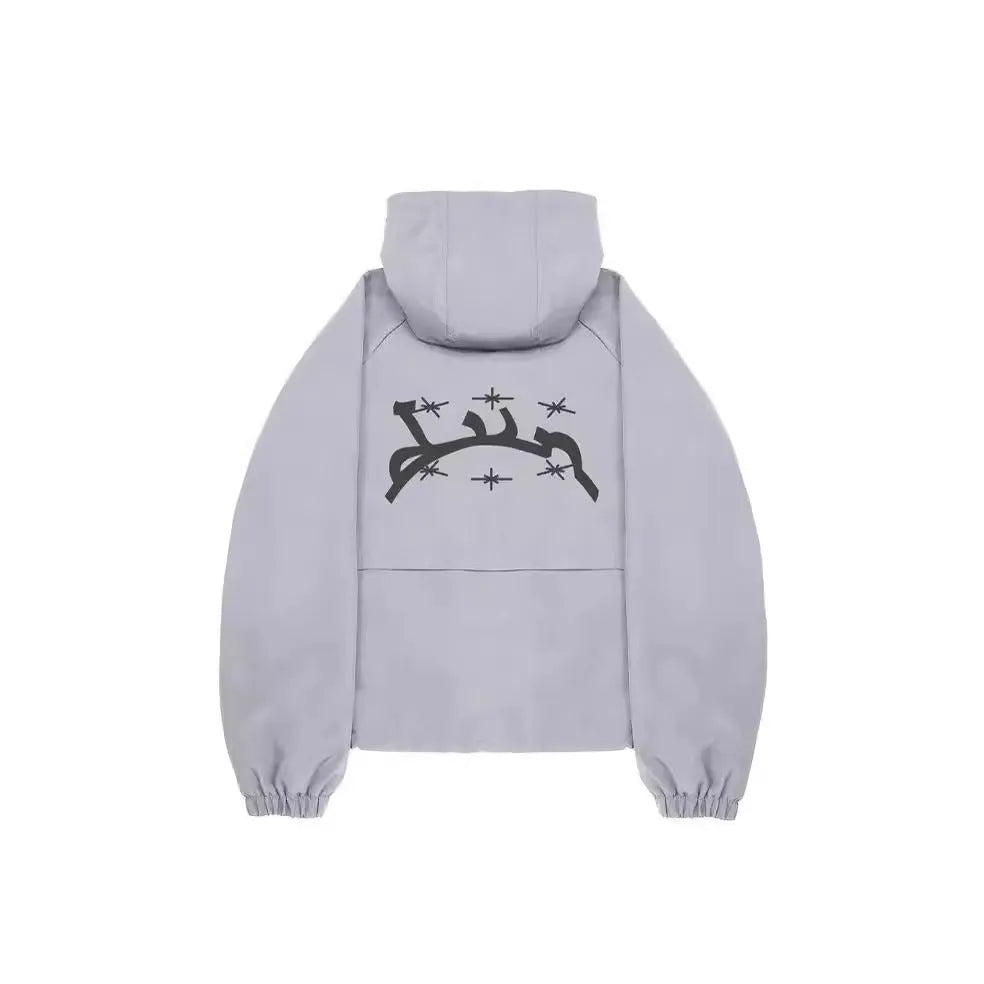 Men's grey hooded sunscreen jacket with loose British style fit on a middle-aged model