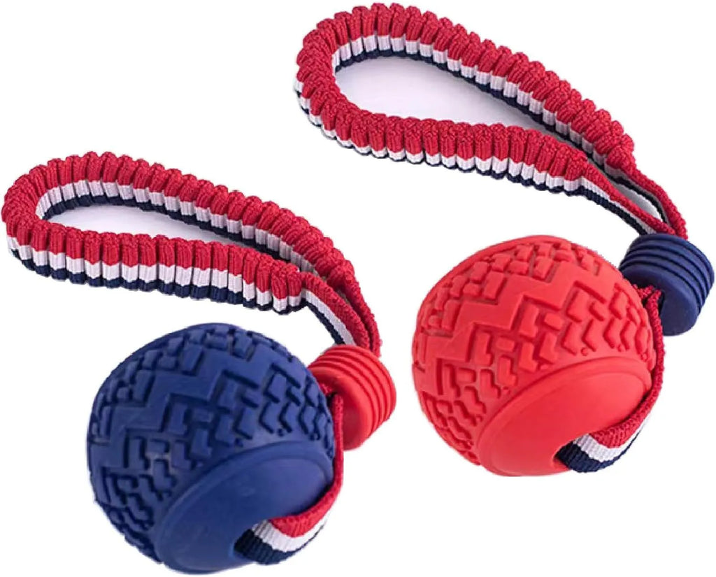 Blue and red dog toy with a rubber ball on a rope for tug-of-war and teeth cleaning.