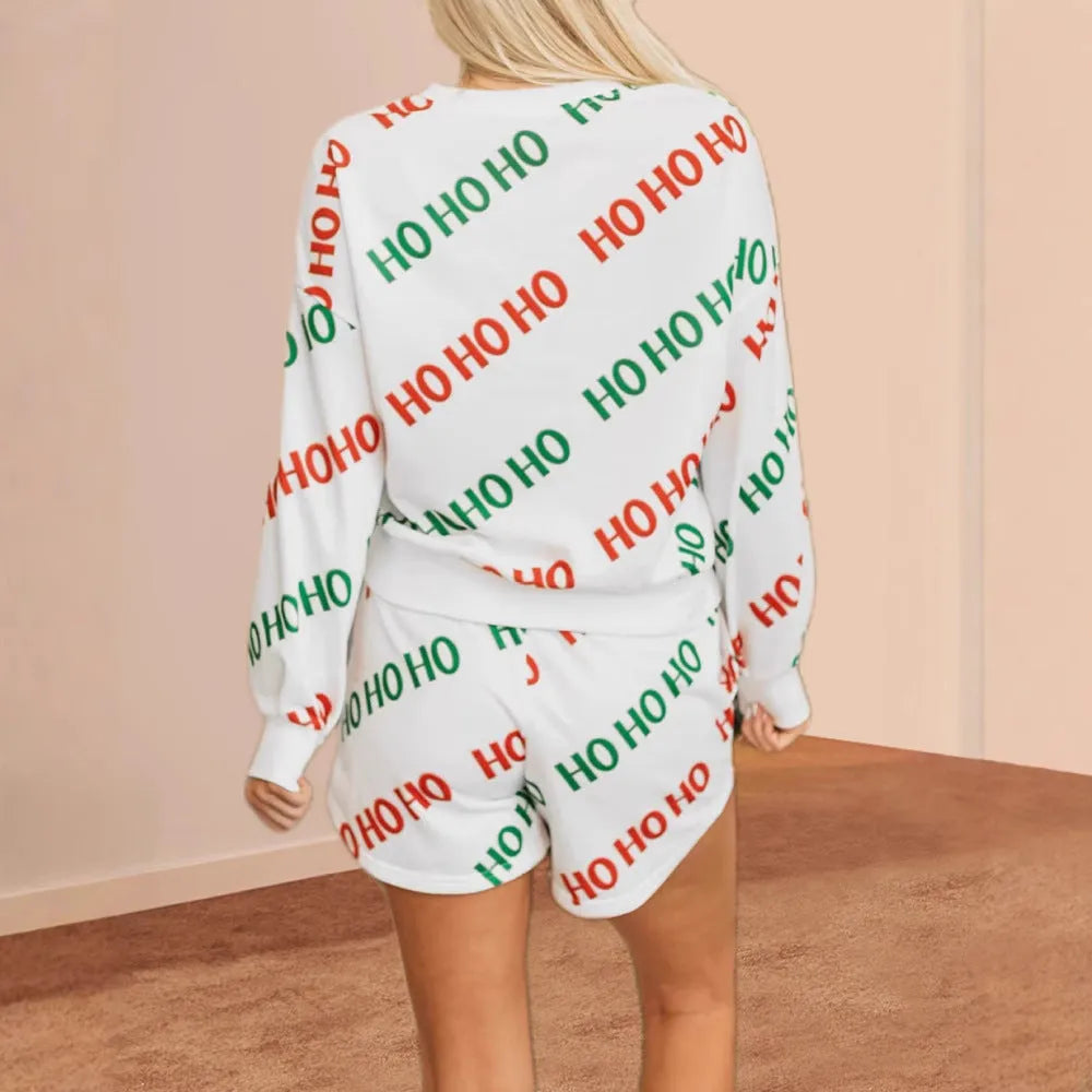 White women's two-piece suit with black letter print pattern and long sleeves