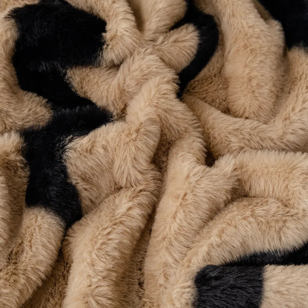Zebra pattern flannel sofa cover with non-slip design shown on living room furniture