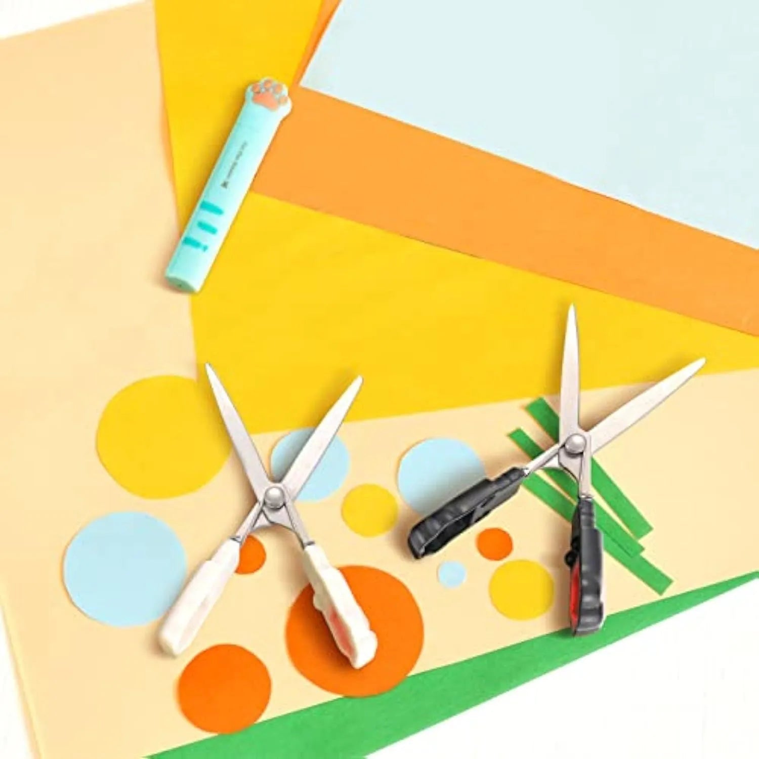 Cat paw mini folding safety scissors showing stainless steel blades and decorative handles in four colour options