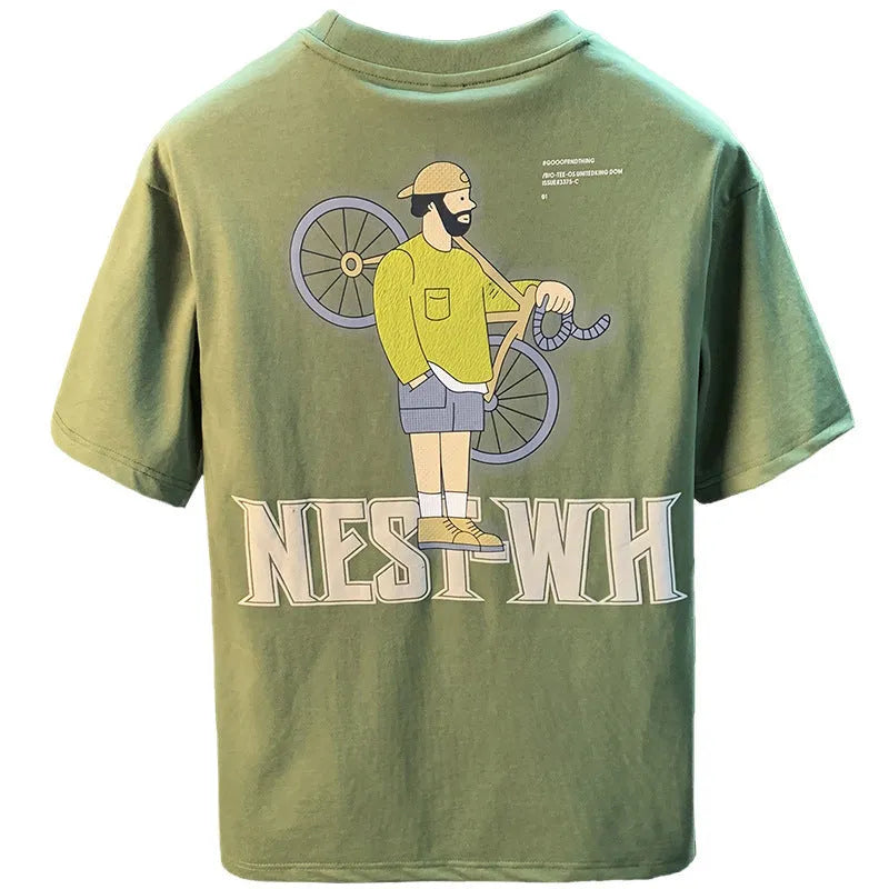 Green loose-fit men's t-shirt with a printed design on the front, featuring short sleeves.