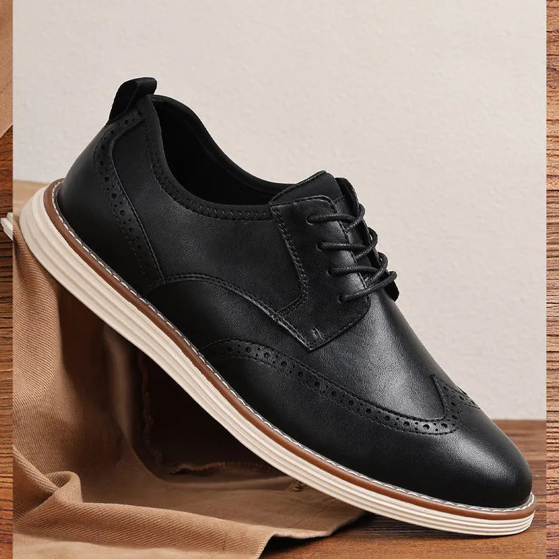 Men's black and brown slip-on business casual shoes with round toe and low top.
