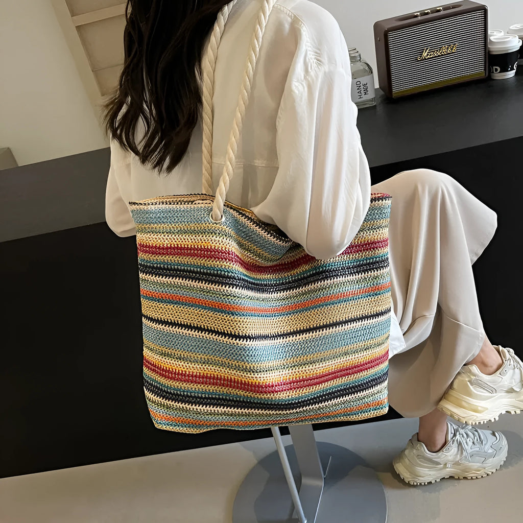 Blue straw woven single-shoulder bag with nylon construction and polyester lining.