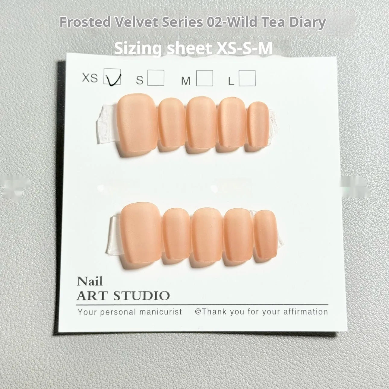 Velvet frosted Cat's Eye gel nail extensions in short ladder sizes XS, S, M with Aurora armour designs