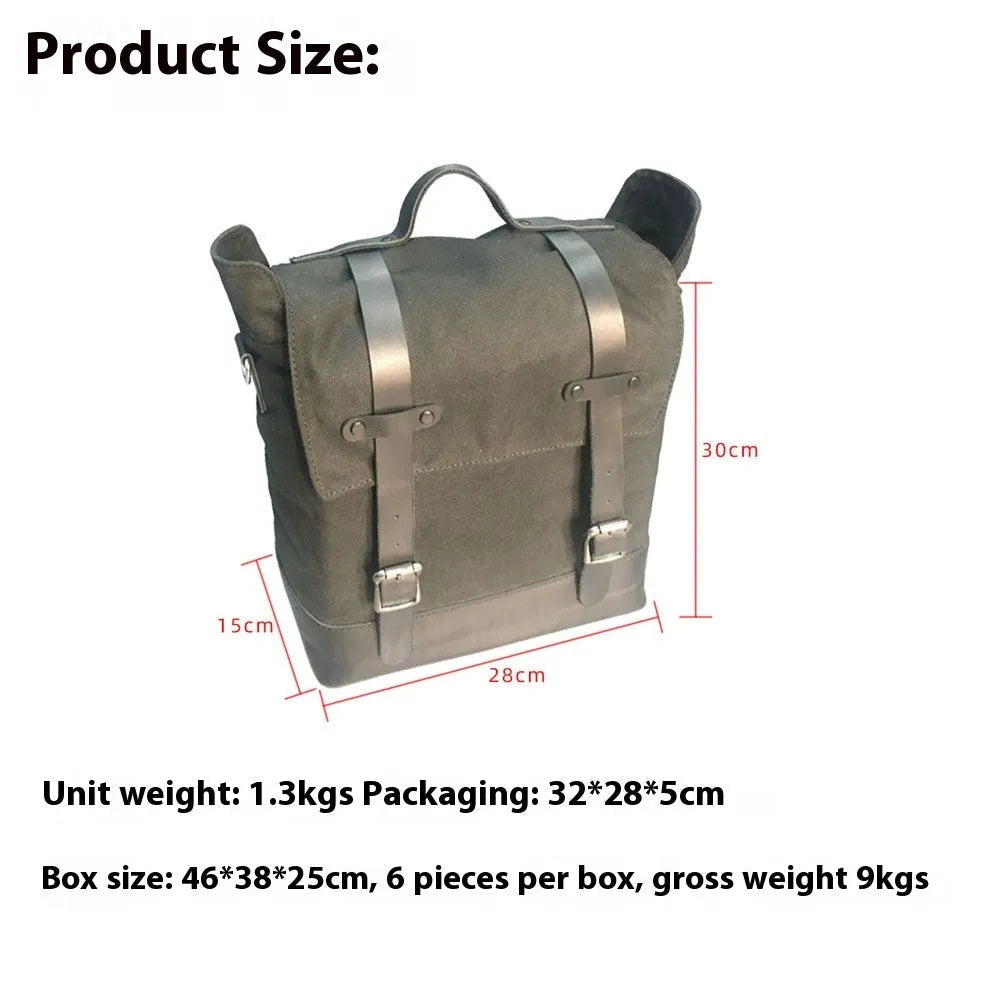 Waterproof canvas motorcycle side bag in black with cowhide accents and mounting straps
