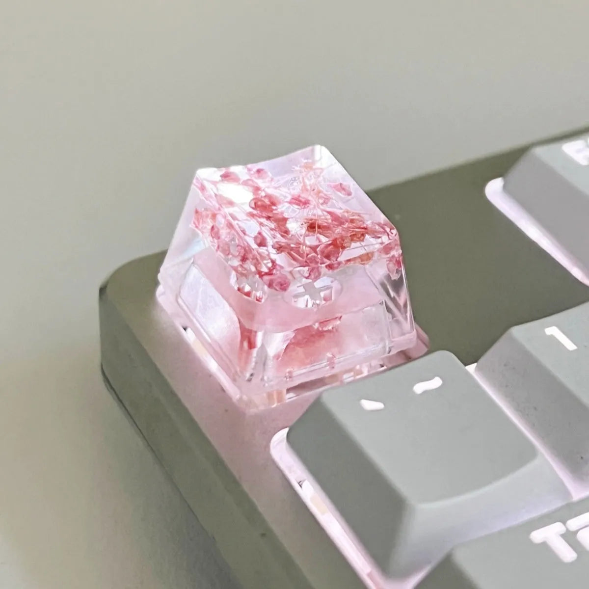 A high-transparency resin mechanical keyboard keycap with a starry sky design, shown in a choice of colours.