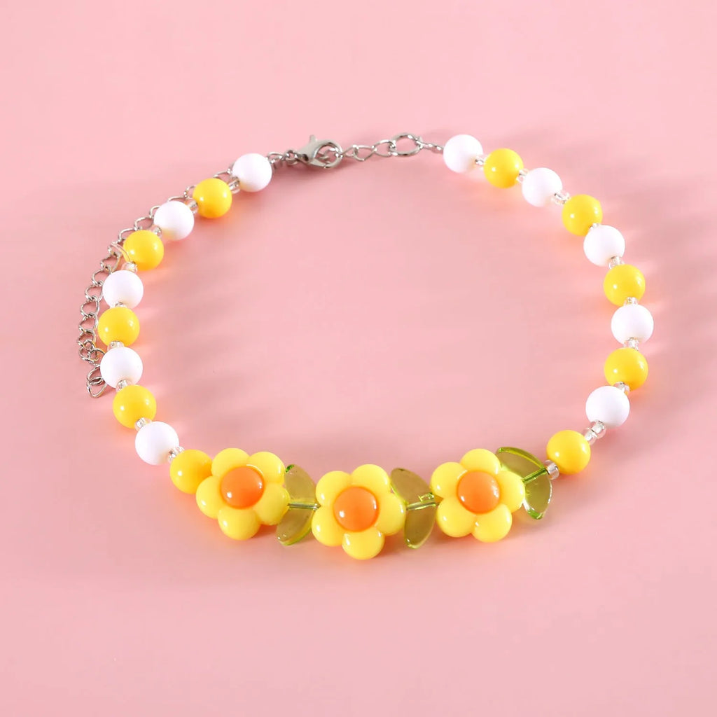 Colourful plastic pearl pet necklace with small flower, rainbow or peach bead patterns and adjustable sizing