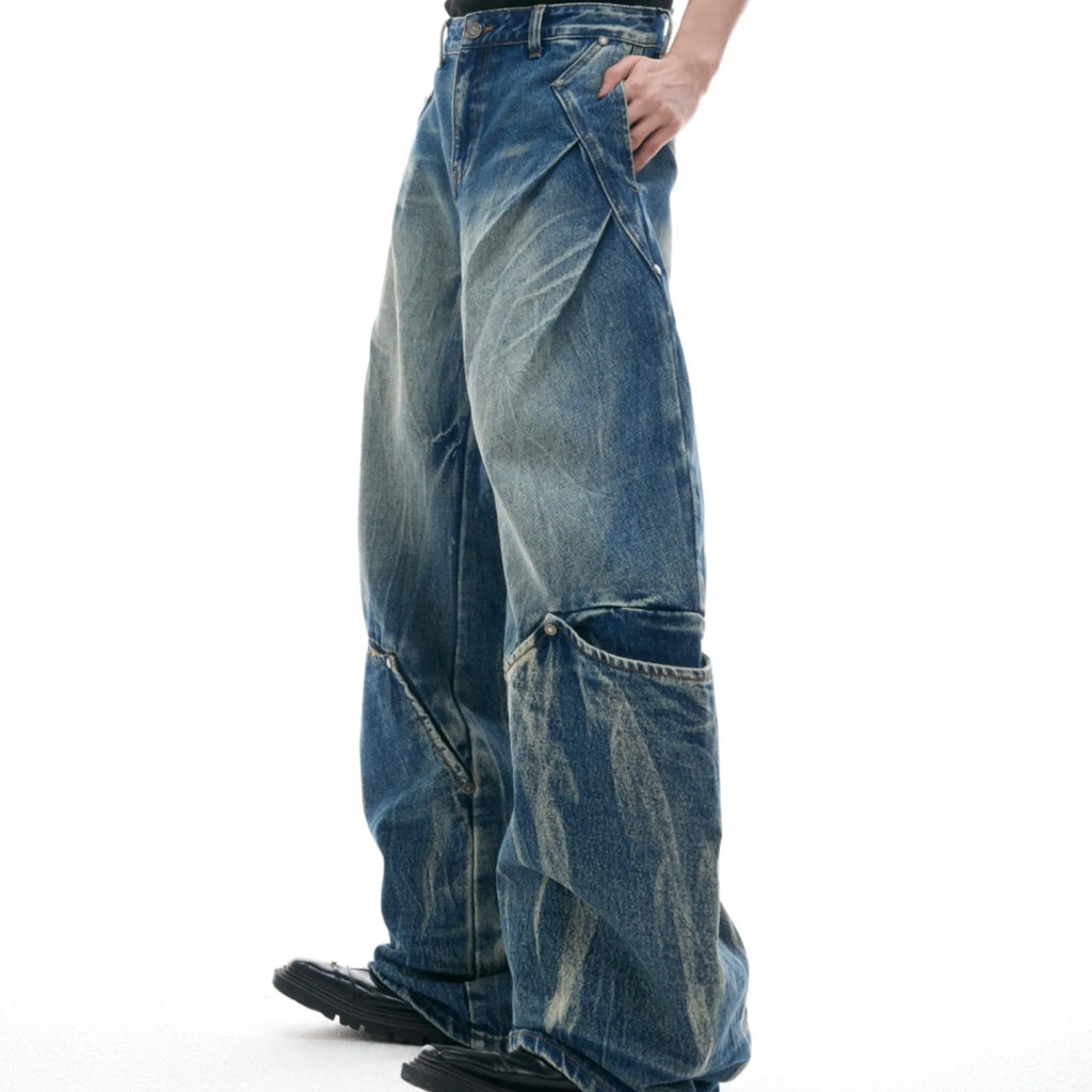 Men's verdant blue retro jeans with washed burst pattern and curved knife detailing