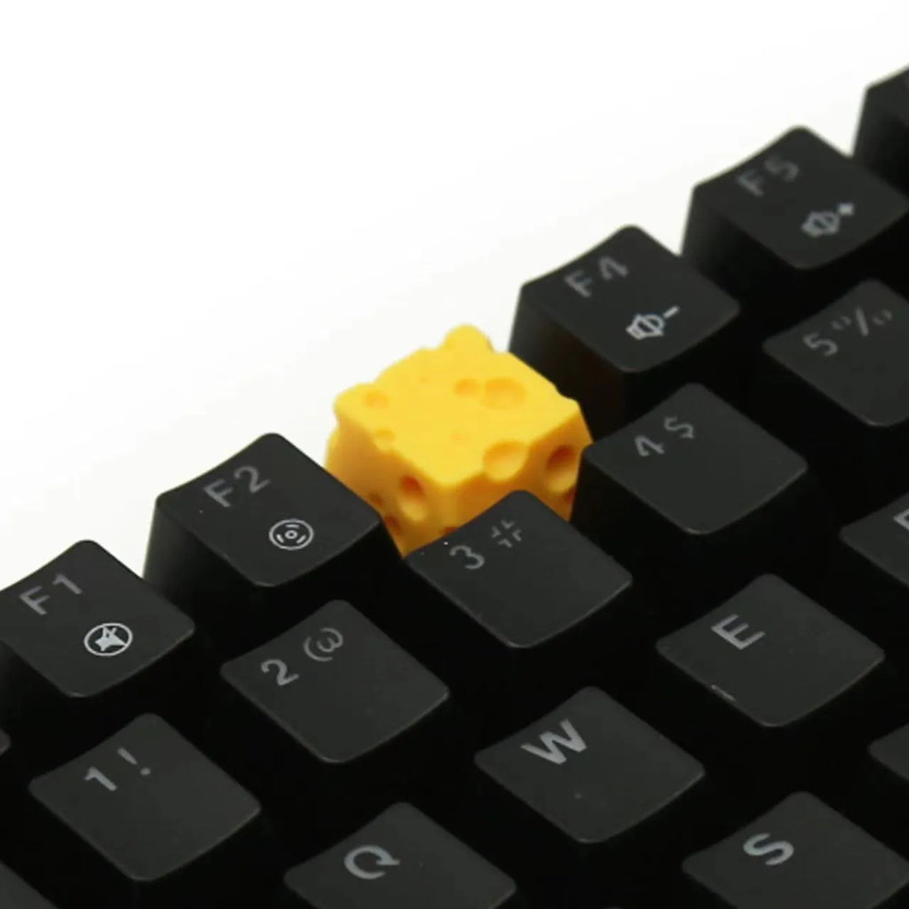 Yellow resin cheese wedge artisan keycap for mechanical keyboards with Cherry MX stem