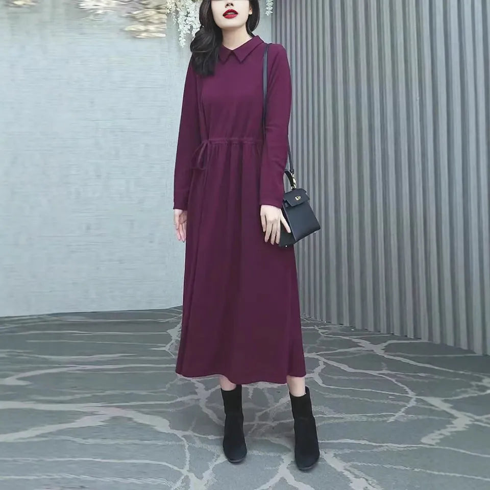 Purplish red plus size women's dress with extra long sleeves and long skirt length