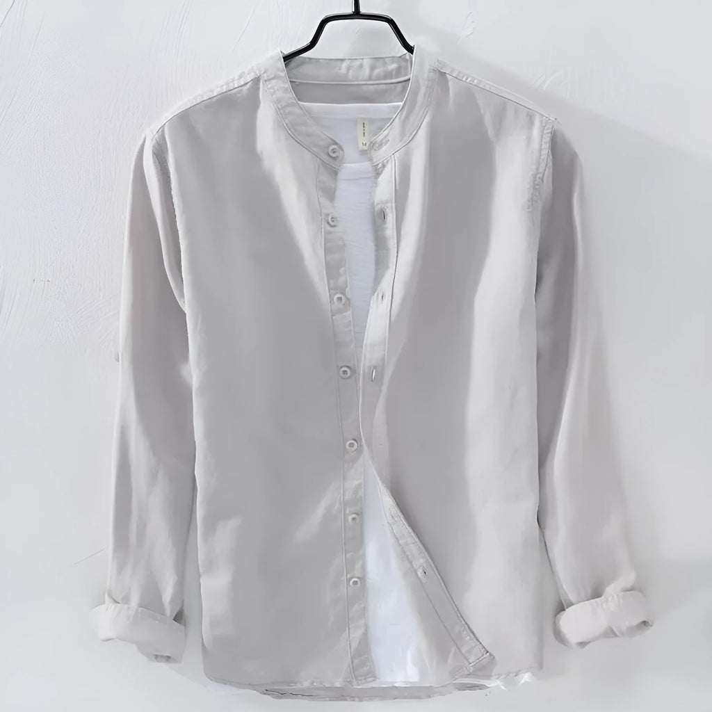 Loose fit long sleeve cotton linen shirt in solid colours on a hanger.