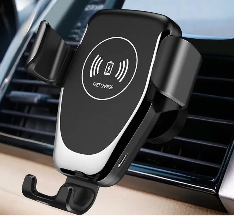 Black car wireless charger with automatic clamping arms holding an iPhone