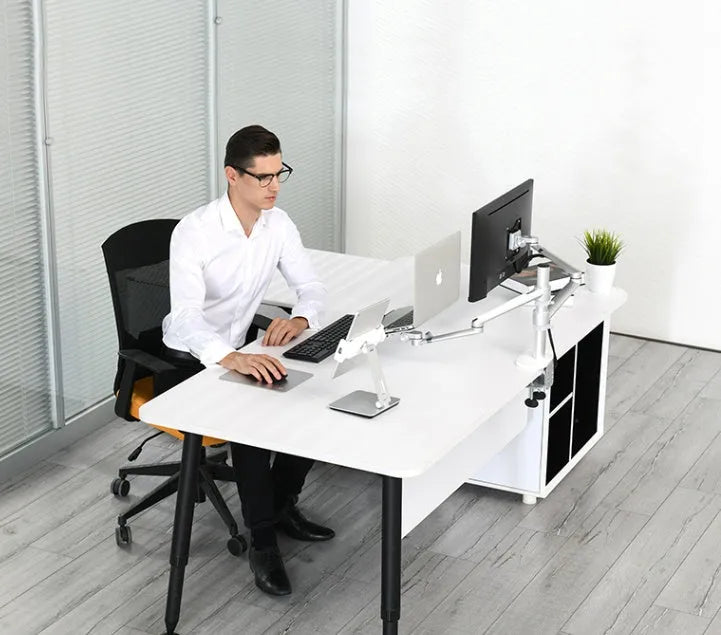Black foldable aluminium phone and tablet stand with 360-degree rotation on a wooden desk