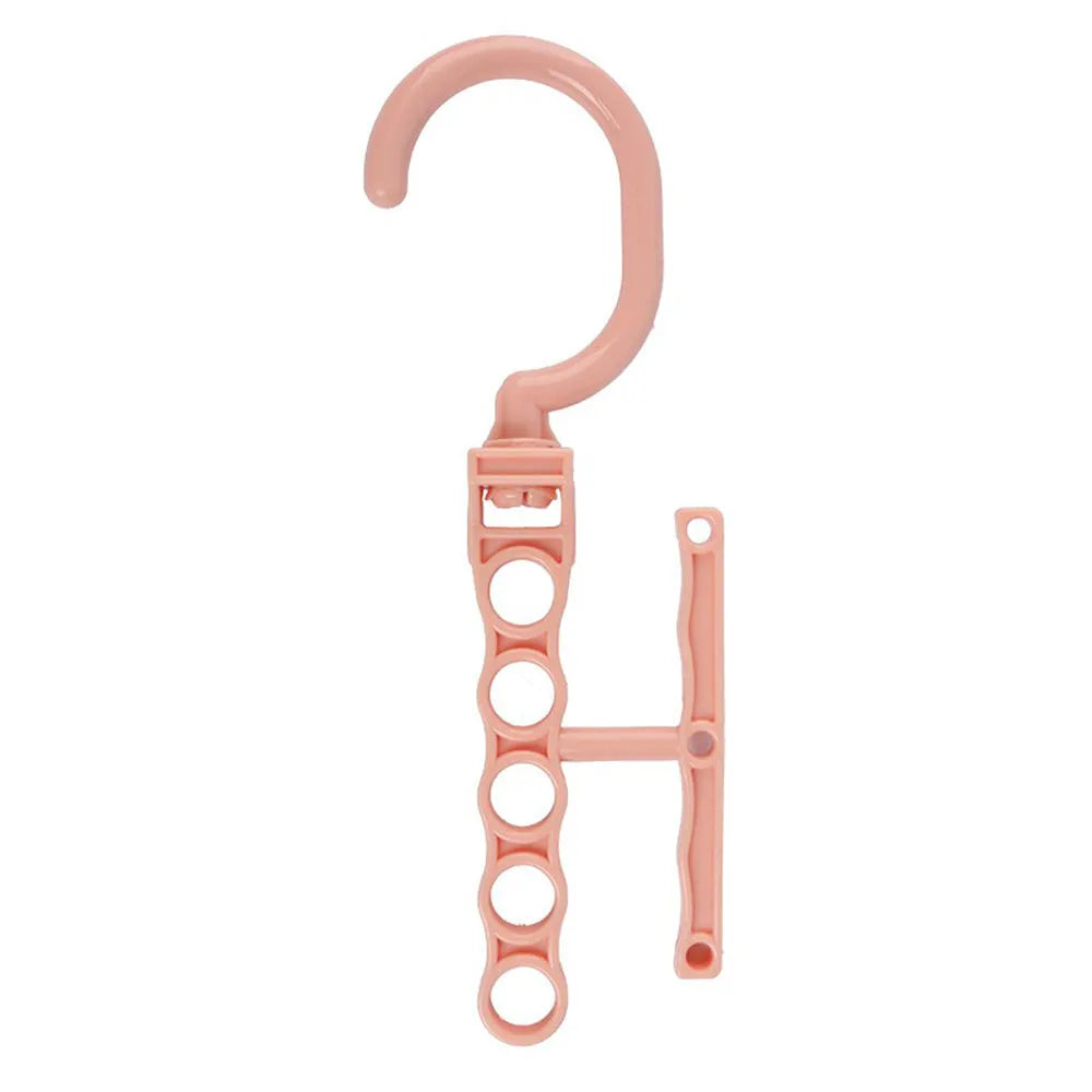 Blue revolving plastic wardrobe hanger with five hooks and a central handle for rotating.