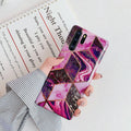 Electroplated marble design TPU mobile phone case for Huawei and Samsung smartphones in various colours.