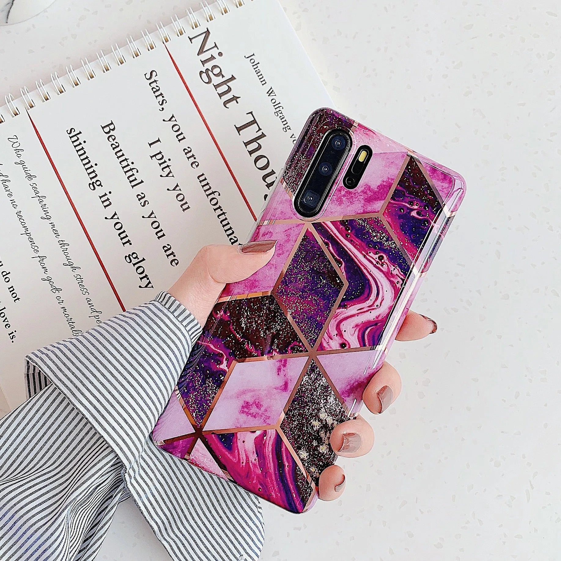Electroplated marble design TPU mobile phone case for Huawei and Samsung smartphones in various colours.