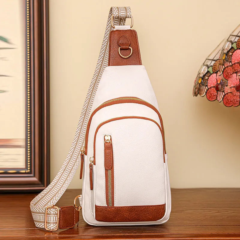 Women's soft PU chest crossbody bag showing open pocket and street style design