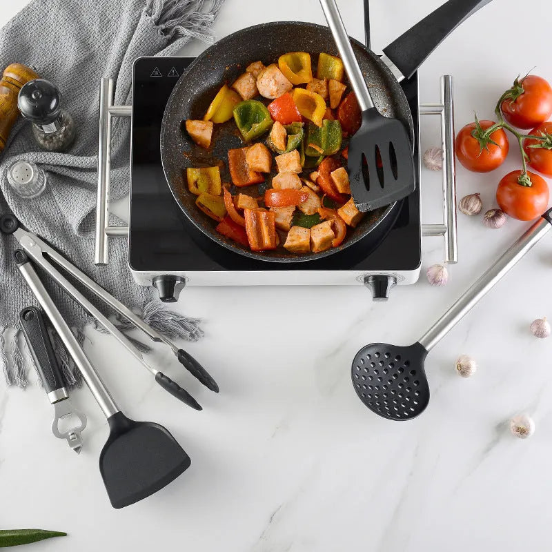 Black silicone kitchen utensil set with stainless steel handles showing 16 cooking tools