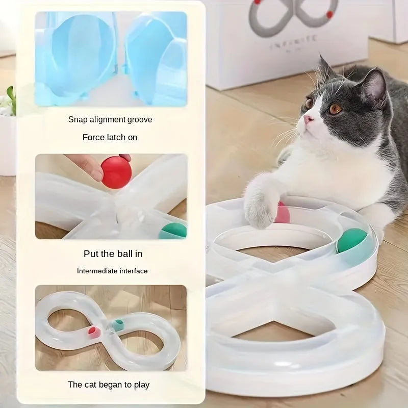 Blue and white plastic cat turntable track ball toy with a teasing stick on a flat surface.