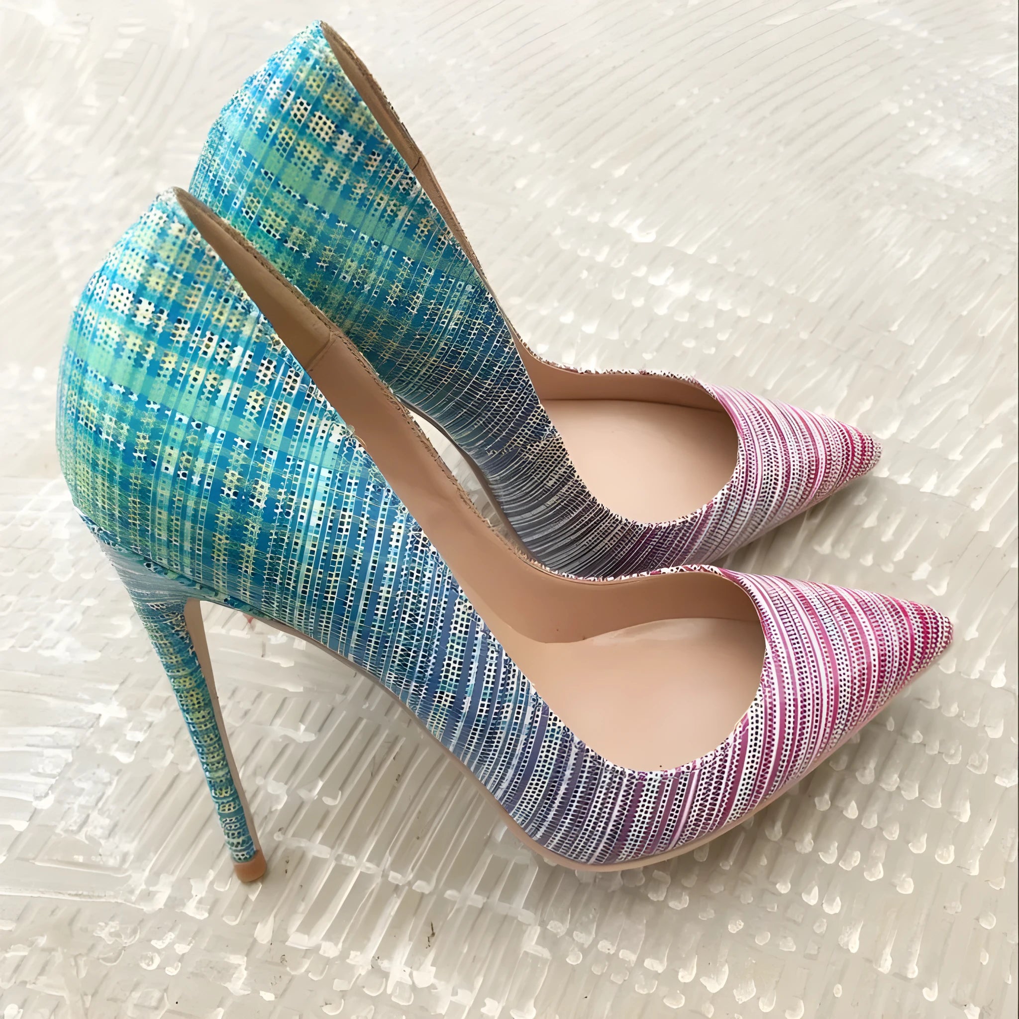 Pink and blue gradient patent leather women's high heels with a pointed toe.