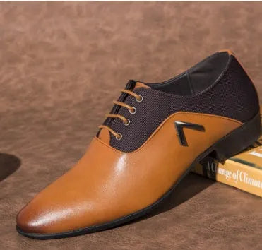 Men's black Oxford shoe with artificial PU upper and rubber sole on a white background
