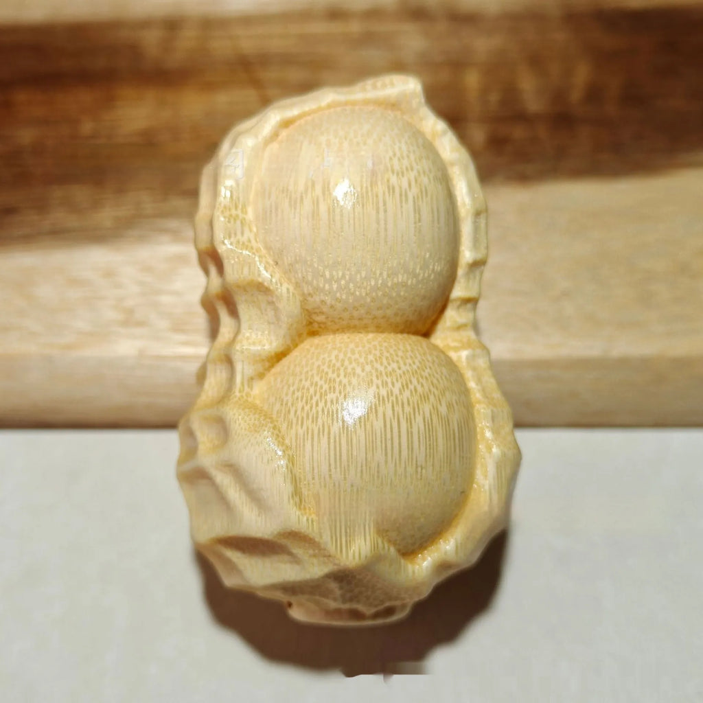 Hand-carved solid bamboo peanut ornament in modern simple style