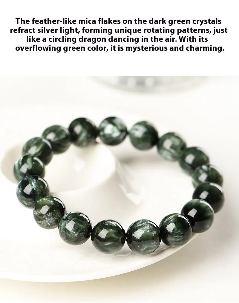 Natural green dragon crystal bracelet with 8-9mm round beads and Ruyi design on wrist.