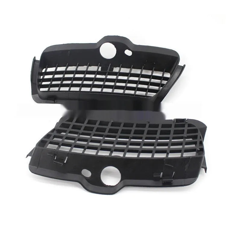 Pair of black ABS plastic Volkswagen Golf 3 fog light covers for the front bumper lower grille.