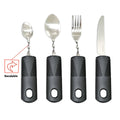 Stainless steel adaptive spoon and spork set with black rubber handle on a table.
