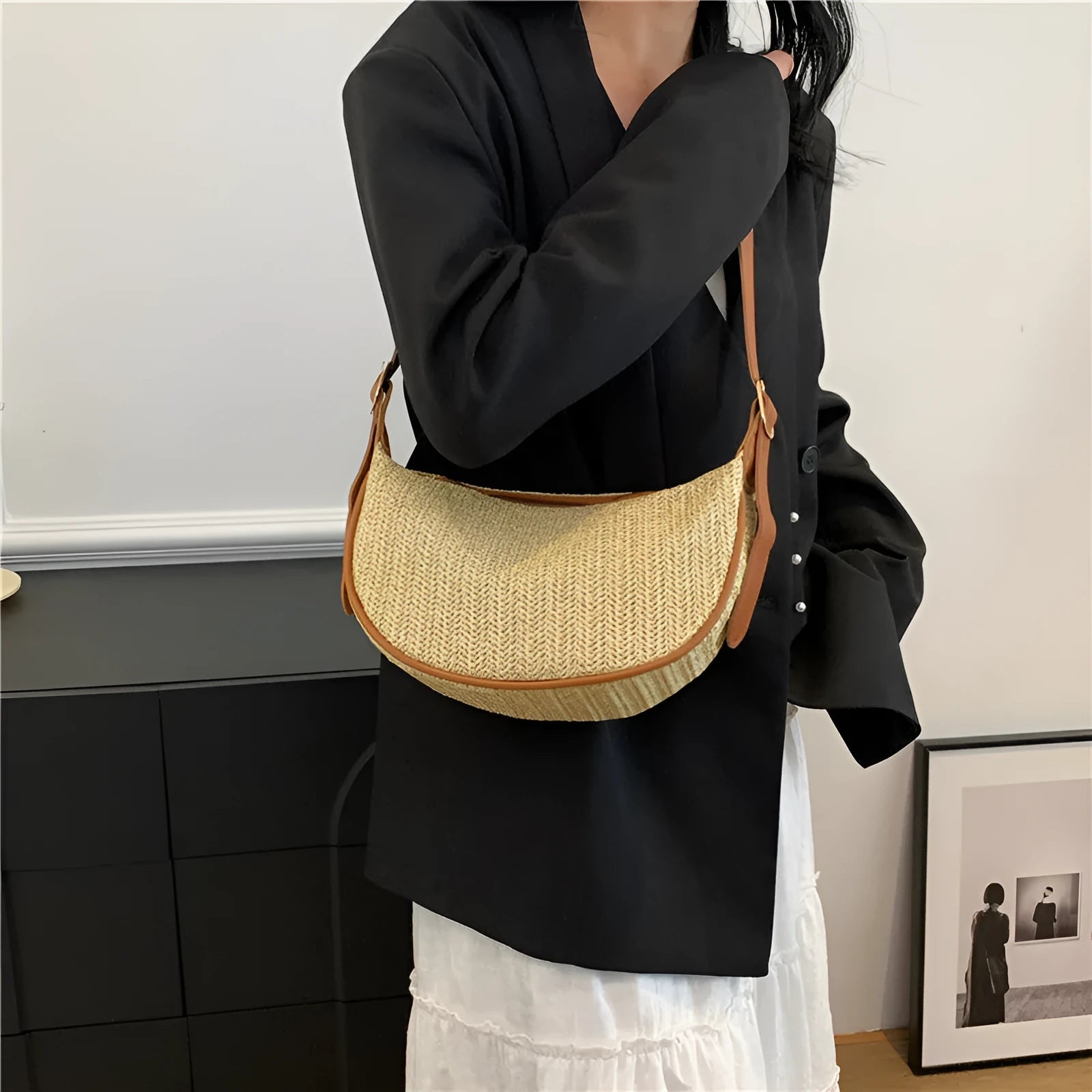 Women's woven straw crossbody bag with single strap and internal phone pocket