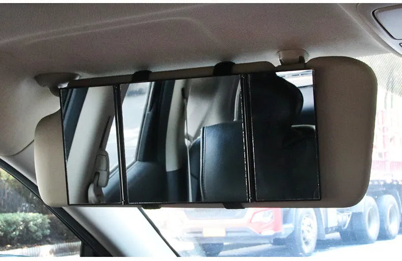 Silver car folding makeup mirror shown in both closed 15.5cm width and opened 30.5cm width positions