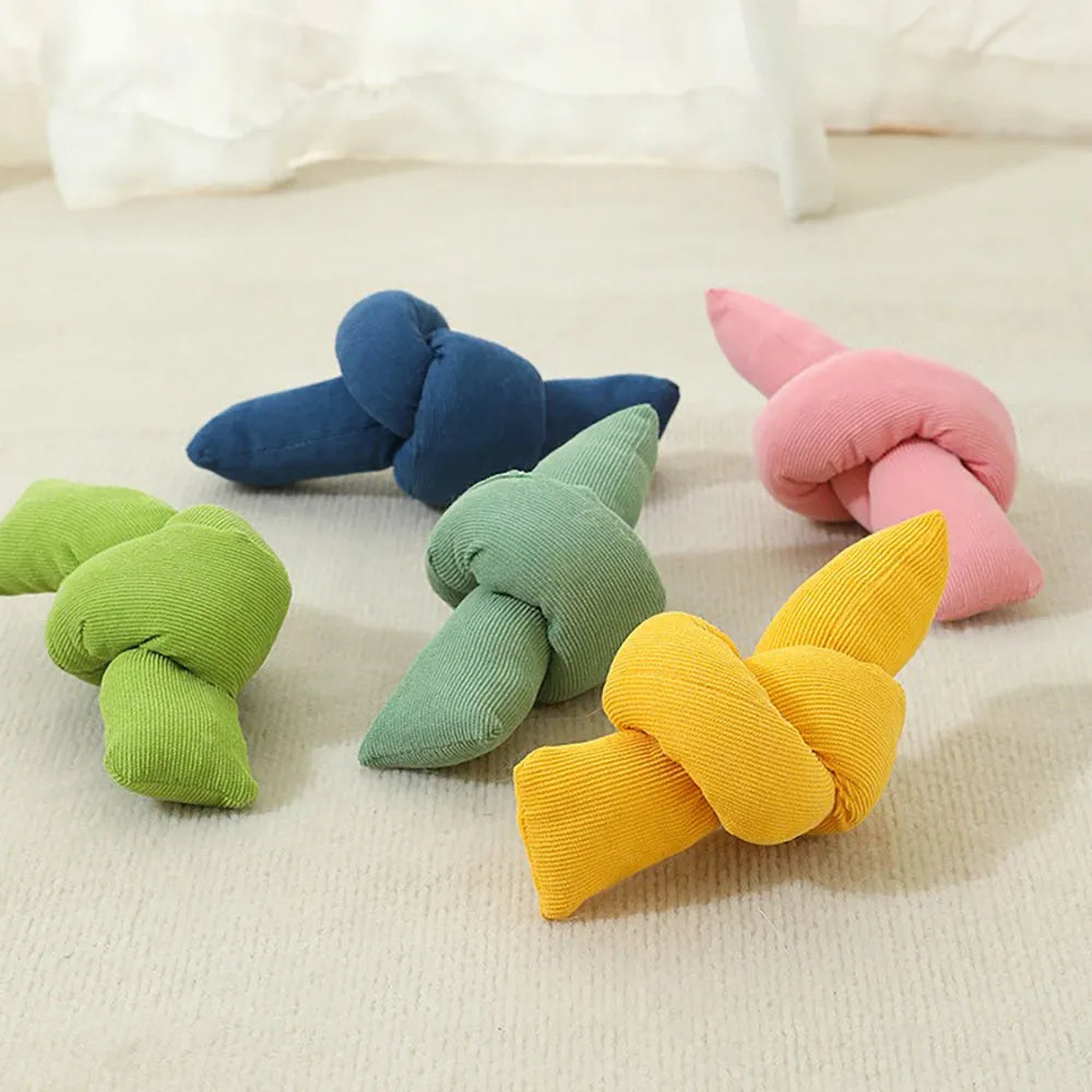 White knotted cotton rope dog toy for tug of war and chewing