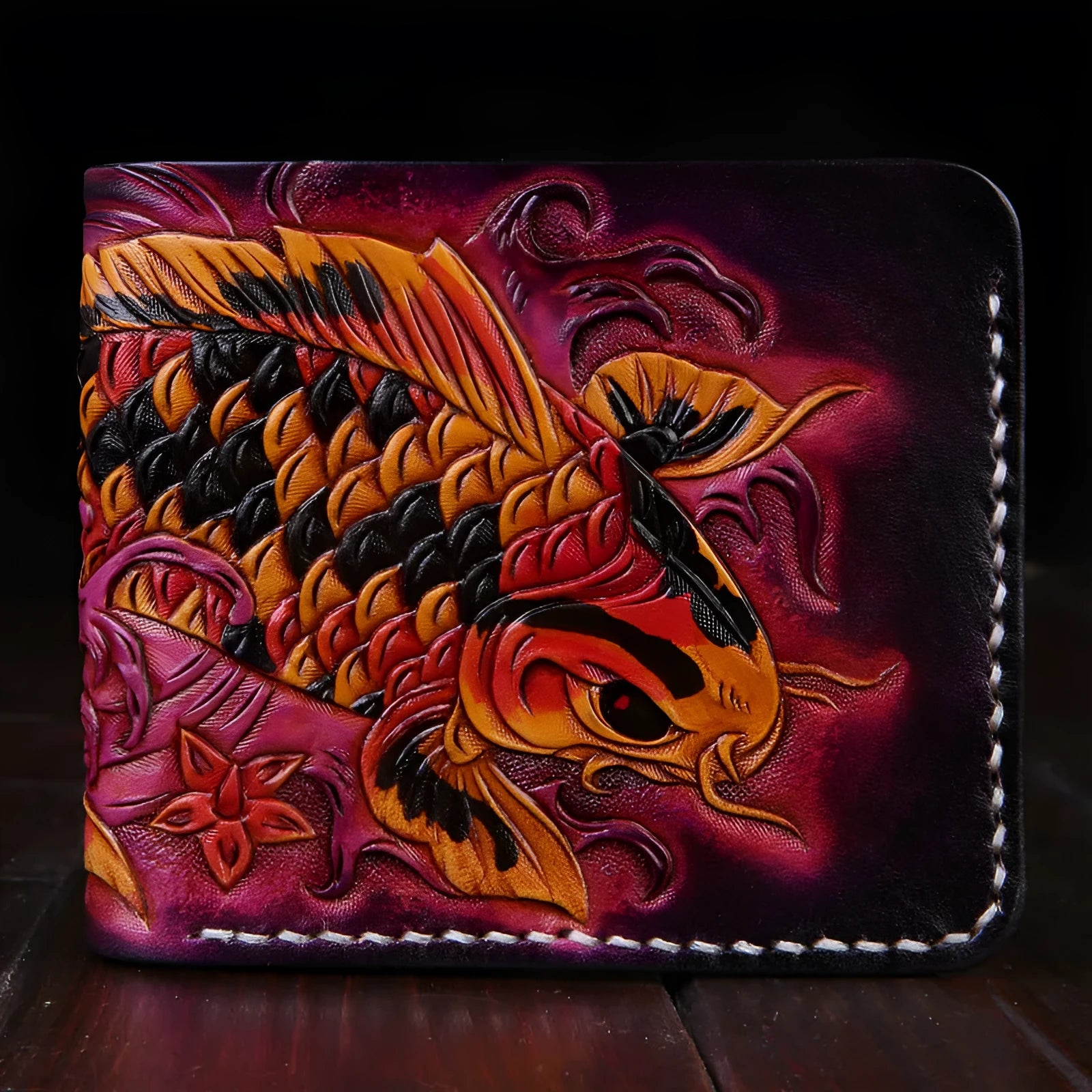 Handcrafted red cow leather men's short wallet with open closure, shown next to a blue and gold version.