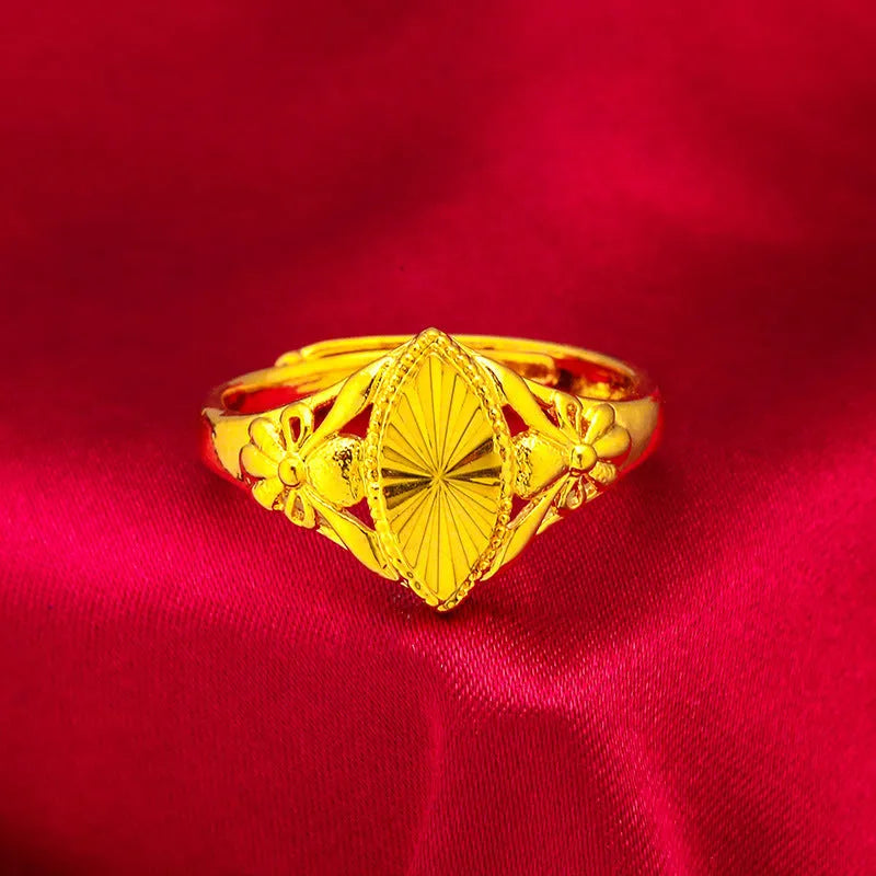 Alluvial gold geometric ring with textured open diamond flower design on brass base